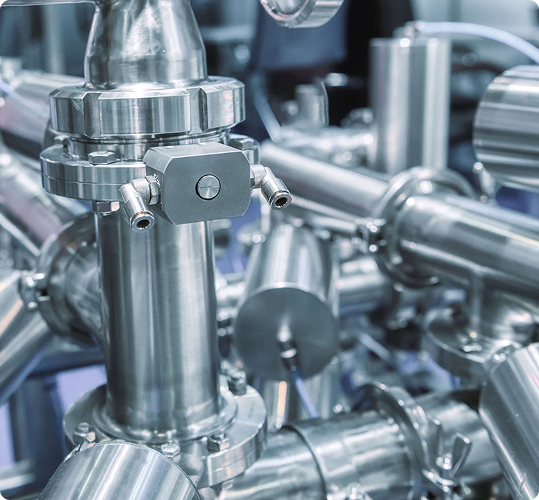 Stainless steel process piping in an industrial facility